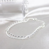 Elegante zilveren armbanden set met zirconium stenen