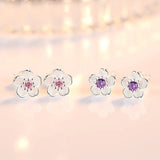 Bloemvormige knopoorbellen met zirconia