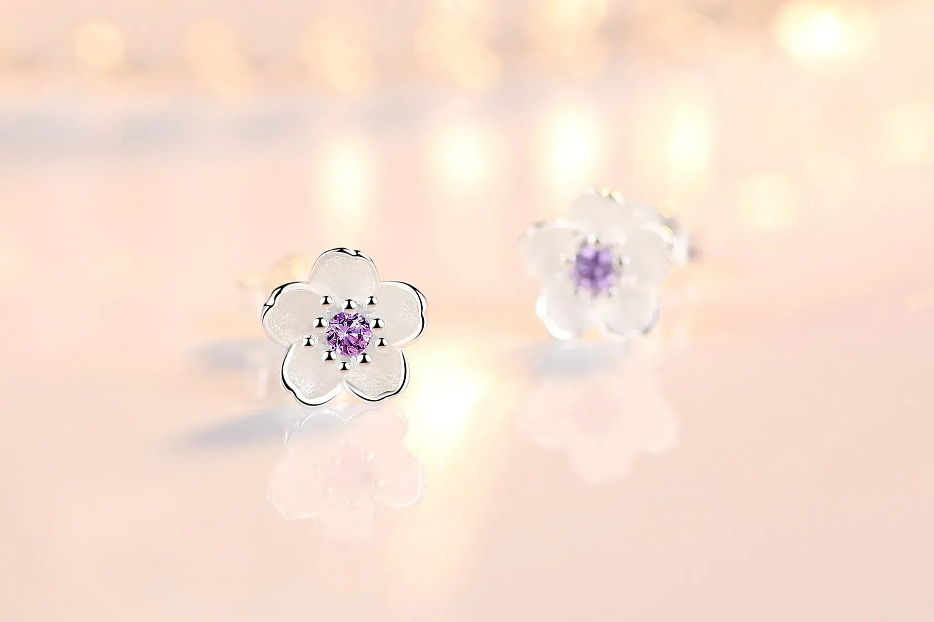 Bloemvormige knopoorbellen met zirconia