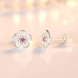 Bloemvormige knopoorbellen met zirconia