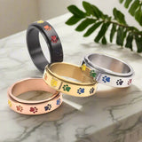 Draaiend Anti-stress Ring – Roestvrij Staal met Regenboog Voetjes