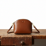 Ambre – Sac besace demi-lune