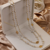 Elegante gouden ketting met parels